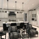 White and Black Vaulted Ceiling Kitchen